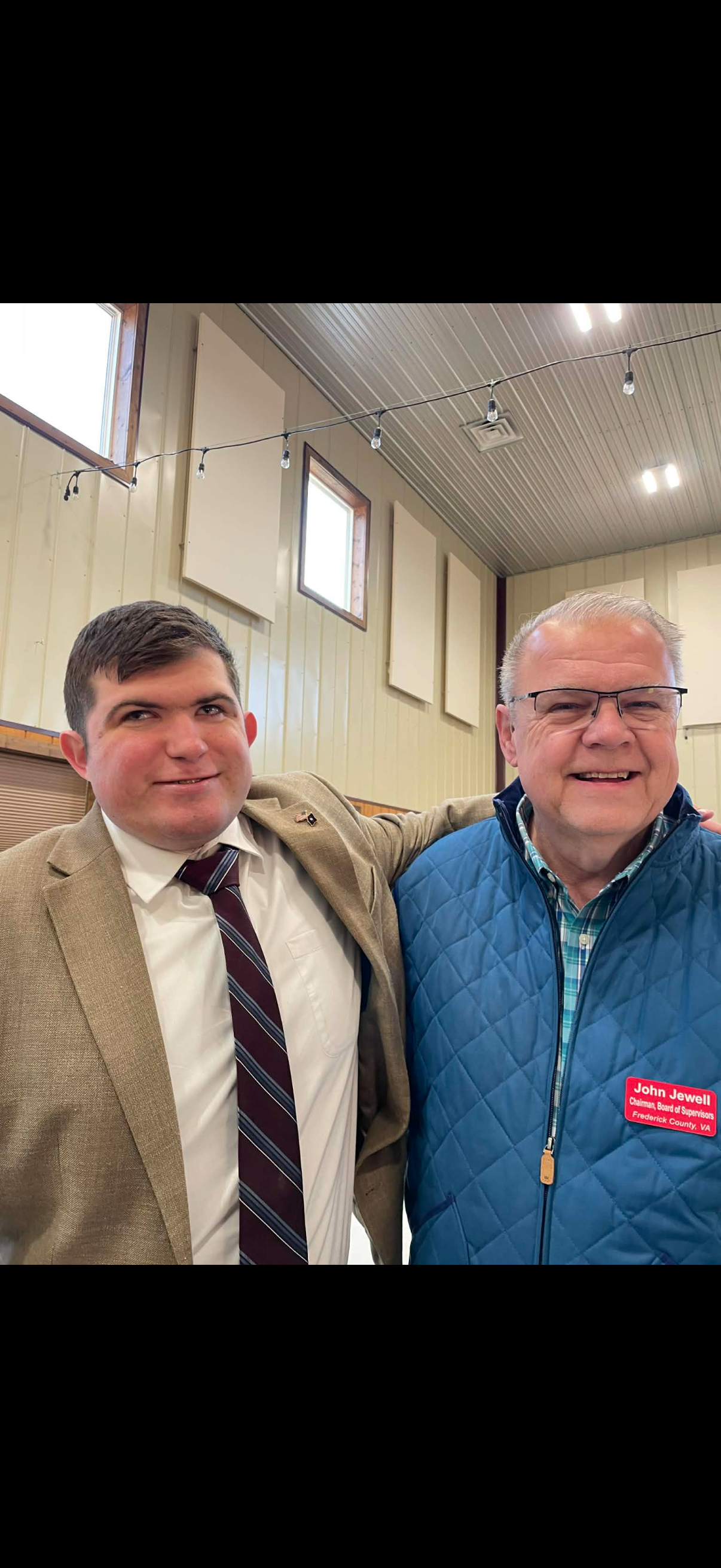 Lucas Cook pictured with a local public official at a community event